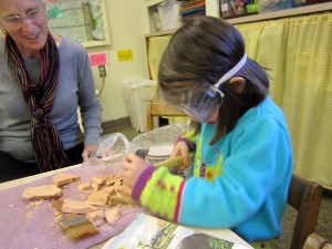 Jordyn works carefully to find the bones